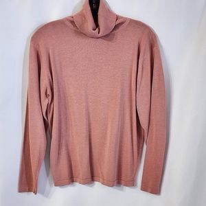 Dusty pink turtleneck sweater by Milano design group